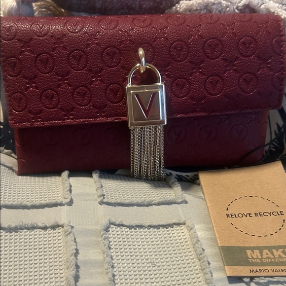 Mario Valentino Handbags - Mario Valentino Burgundy Clutch with Silver Chain Accent